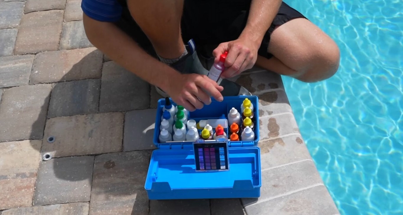 Pool technician performing precision pool care and water testing in San Leandro, CA